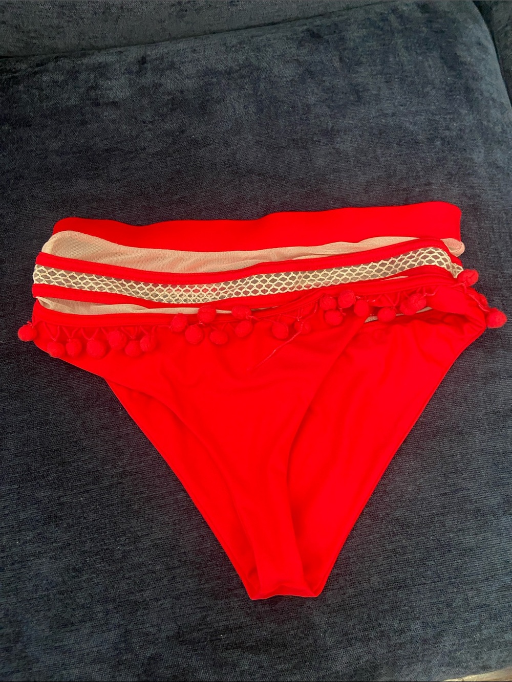 Tularosa slight flaw tomato red swim bottoms. Size Medium.